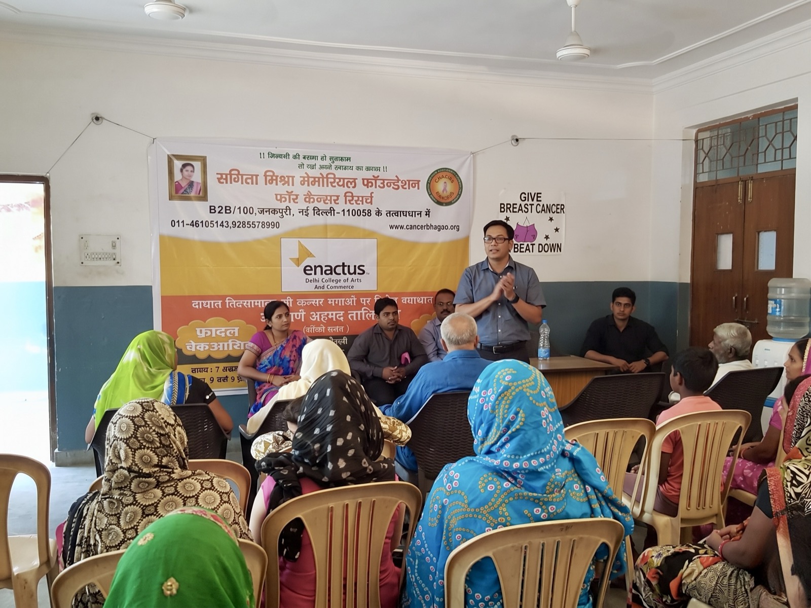 Dr. Bhatnagar at a breast-cancer awareness camp with Enactus